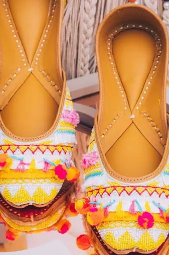 Multicolor embroidered leather juttis