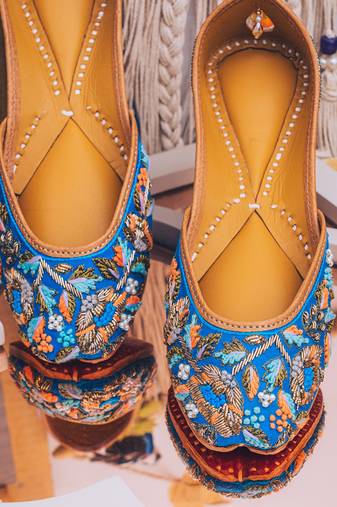 Blue embroidered leather juttis