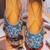 Blue embroidered leather juttis