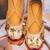 Gold embroidered leather juttis