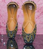 Black embroidered leather juttis