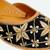 Black embroidered leather juttis