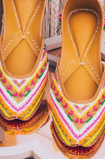Multicolor embroidered leather juttis