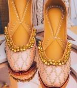 Pink embroidered leather juttis