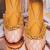 Pink embroidered leather juttis