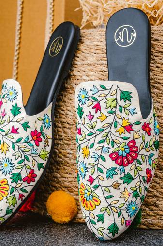 White embroidered leather mules
