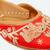 Red embroidered leather juttis