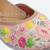 Peach embroidered leather juttis