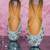 White embroidered leather juttis