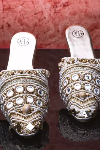 Gold embroidered leather mules
