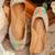 Pink embroidered leather juttis