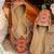 Red embroidered leather juttis