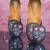Navy blue embroidered leather juttis