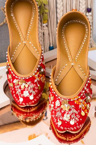 Red embroidered leather mules