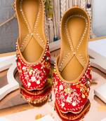 Red embroidered leather mules