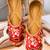 Red embroidered leather mules