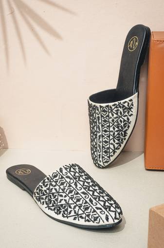 Black embroidered leather mules