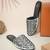 Black embroidered leather mules