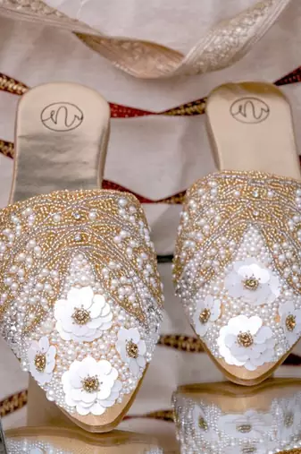 Gold embroidered leather mules