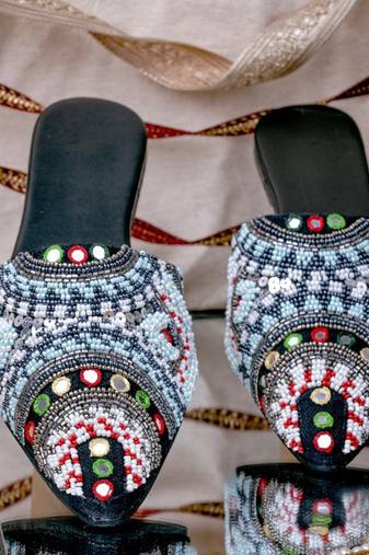 Black embroidered leather mules
