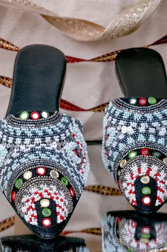 Black embroidered leather mules