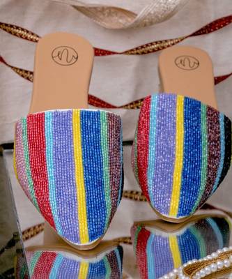 Multicolor embroidered leather mules 1
