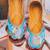 Blue embroidered leather juttis