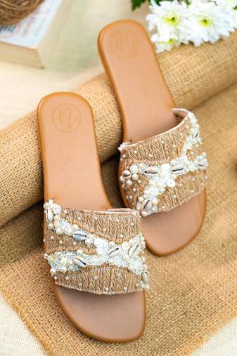 Beige embroidered leather flats