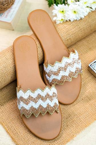 Beige embroidered leather flats