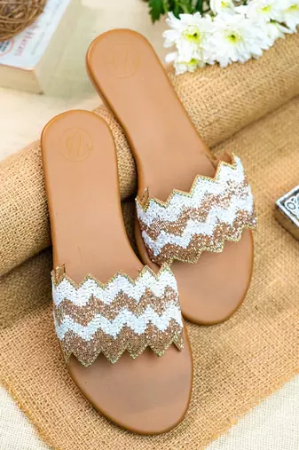 Beige embroidered leather flats