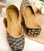 Black embroidered leather juttis