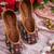 Brown embroidered leather juttis