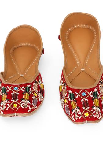 Red embroidered leather juttis