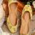 Yellow embroidered leather juttis