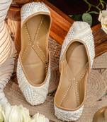 White embroidered leather juttis