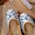 Grey embroidered leather juttis