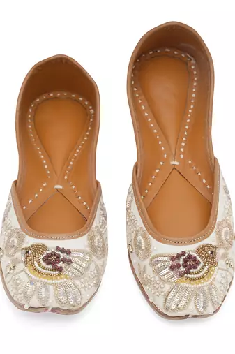 White embroidered leather juttis