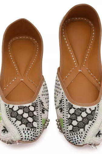 White embroidered leather juttis