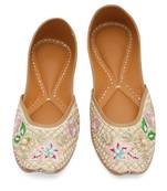 Beige embroidered leather juttis
