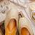 Beige embroidered leather juttis