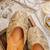 Gold embroidered leather juttis