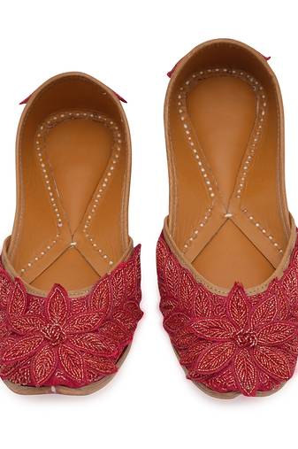 Red embroidered leather juttis