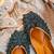 Navy blue embroidered leather juttis