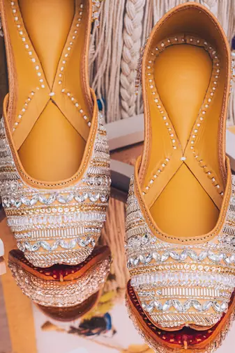 Gold embroidered leather juttis