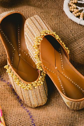 Gold pearl embroidered leather juttis