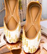 White embroidered leather juttis