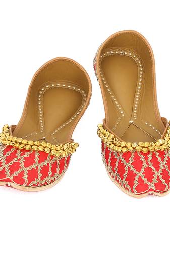 Red embroidered leather juttis