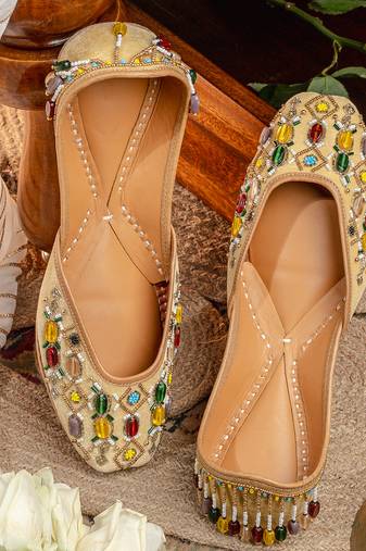 Gold beads embroidered leather juttis