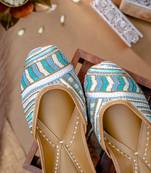 White embroidered leather juttis