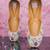 Peach floral embroidered leather juttis